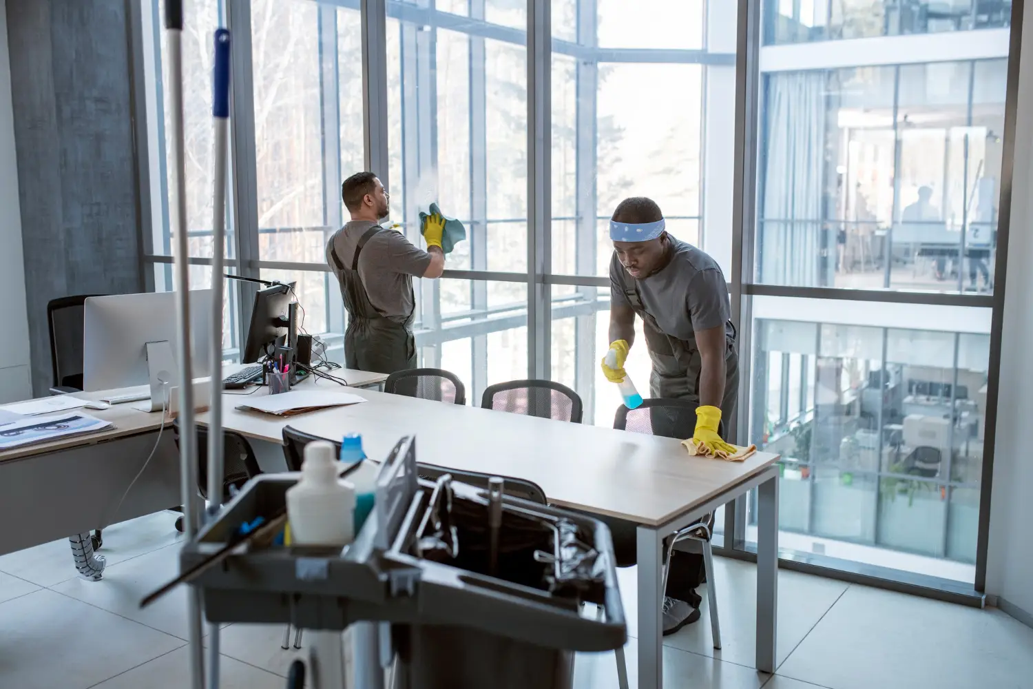MM Pro Clean team members cleaning a commercial space