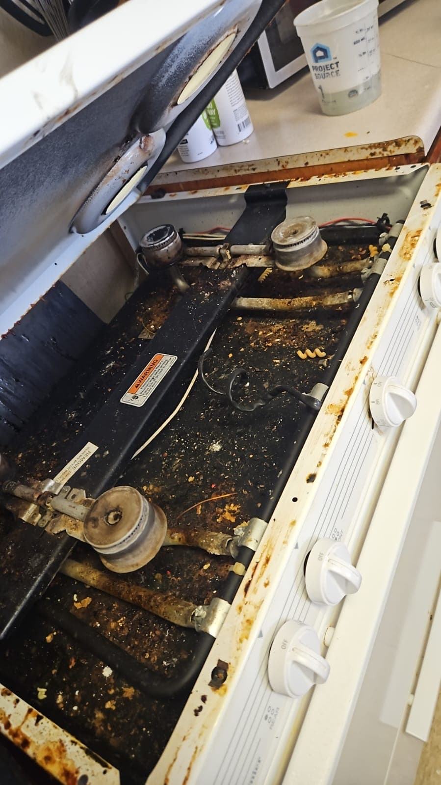 Stovetop Burners before cleaning