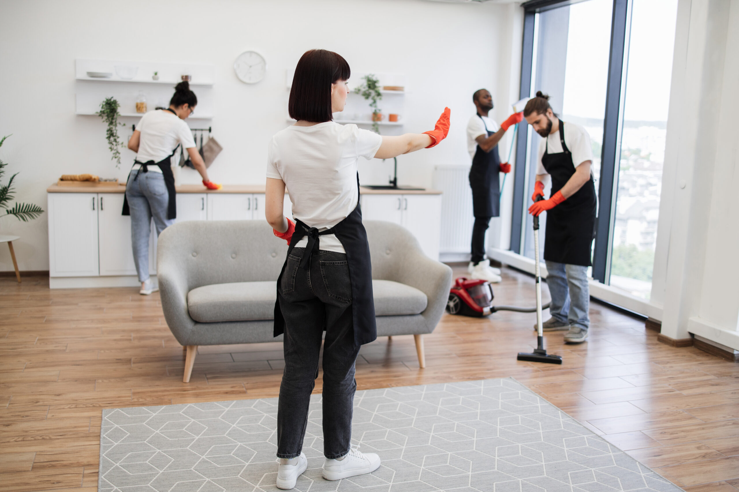 Two person professional cleaning team working different rooms to cut deep cleaning time in half