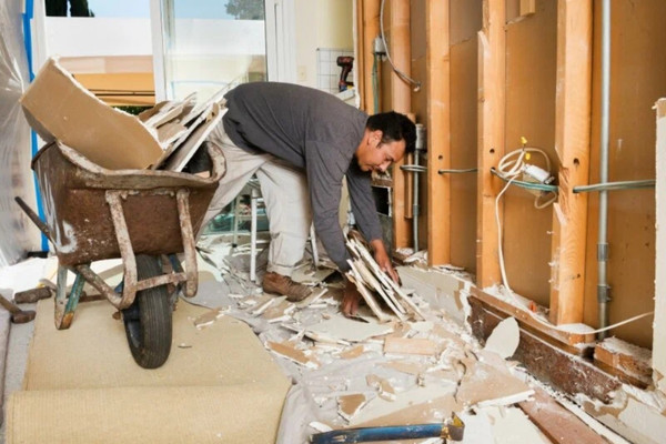 Post-construction cleaning crew detailing a newly built San Diego home after renovation